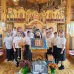 В праздник Покрова Божией Матери священнослужители освятили маскировочные сети для участников СВО